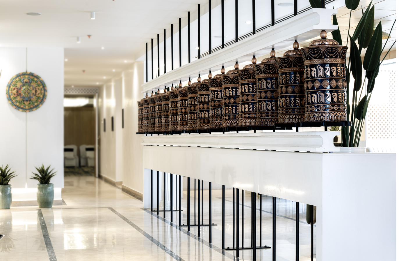 Fifteen prayer wheels in the lobby
