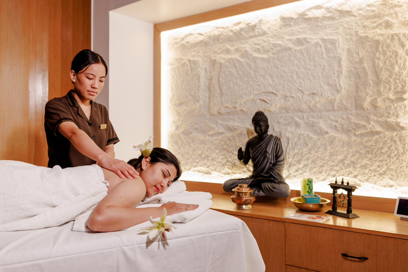 The spa — salt-rock walls and a Buddha